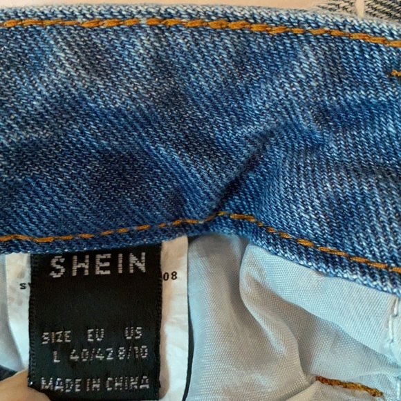 ripped light wash jean shorts - Picture 2 of 4